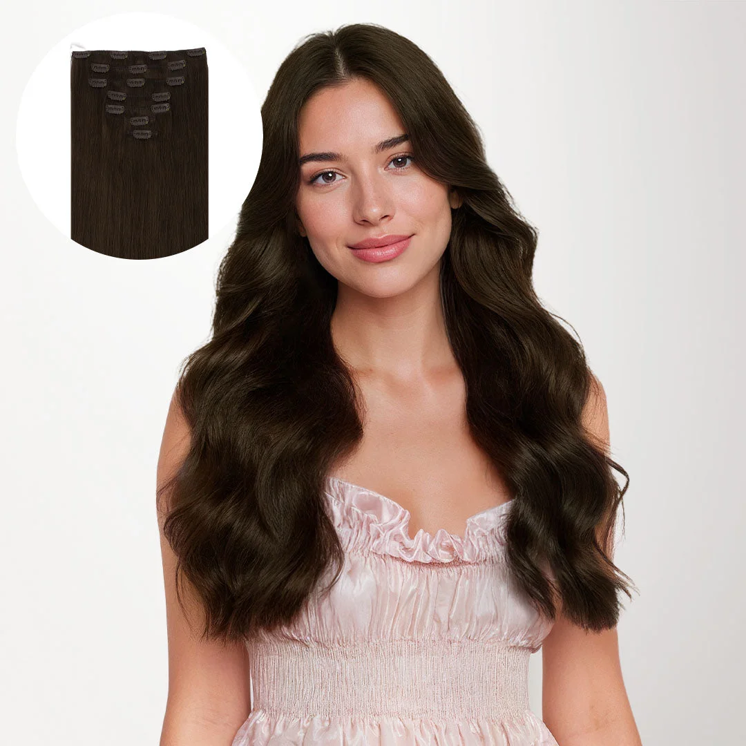 Model with chocolate-brown waves wearing a pink top in official GOO GOO product photography