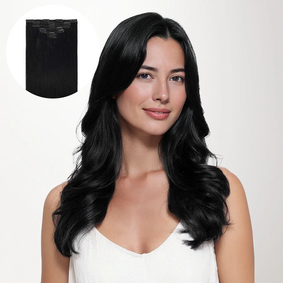 Model with dark wavy hair wearing a white top in official GOO GOO product photography