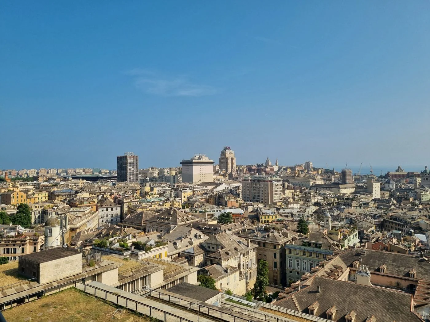 A panoramic view of Genoa and its historic buildings.